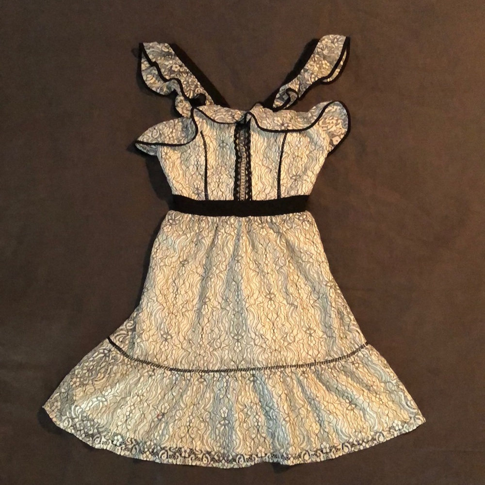 Beautiful delicate lacey black and white adeptness Rae dress.